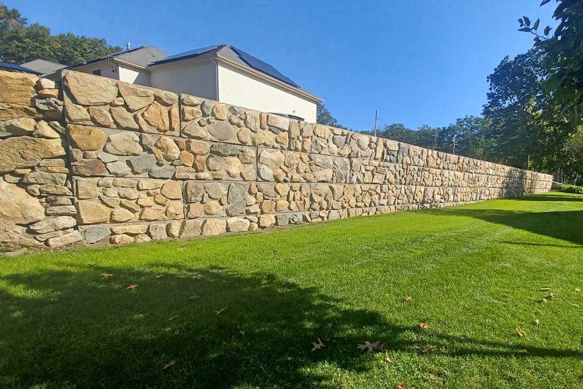 The Natural Landscape Inc. – New England fieldstone block wall