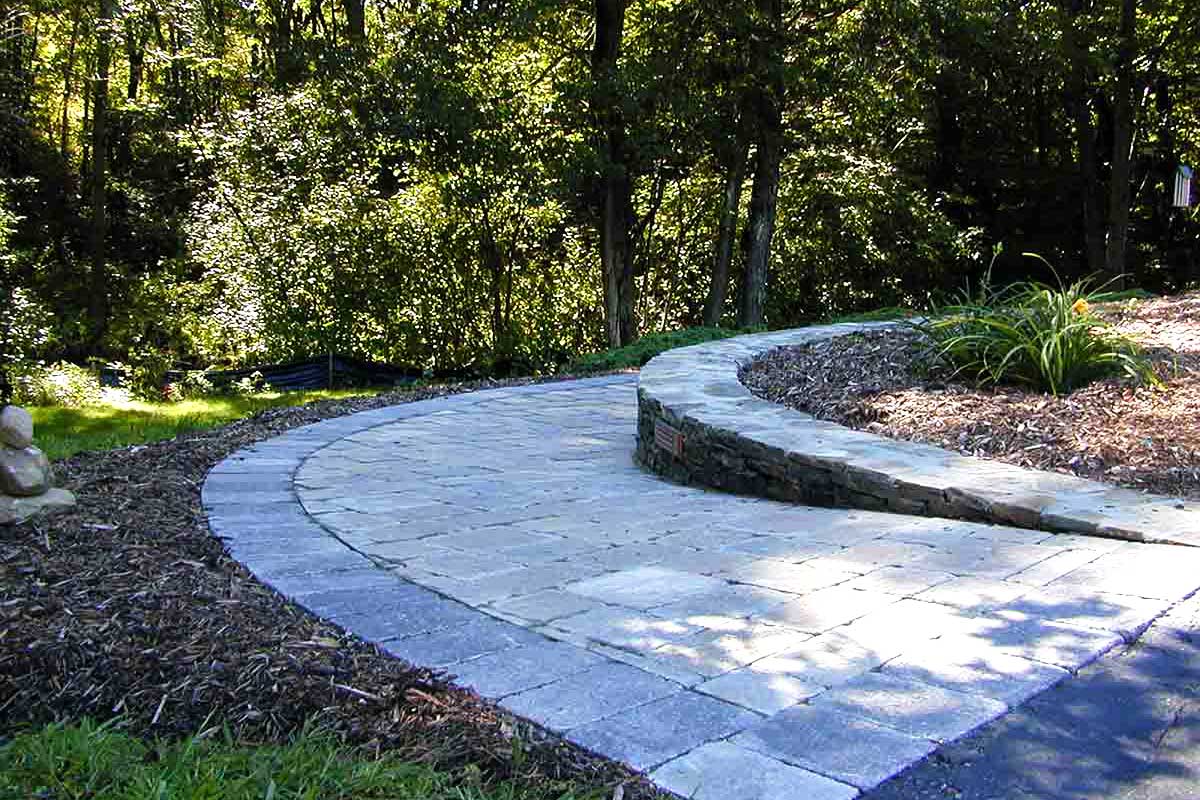 The Natural Landscape Inc. – Pennsylvania fieldstone wall and concrete paver walkway